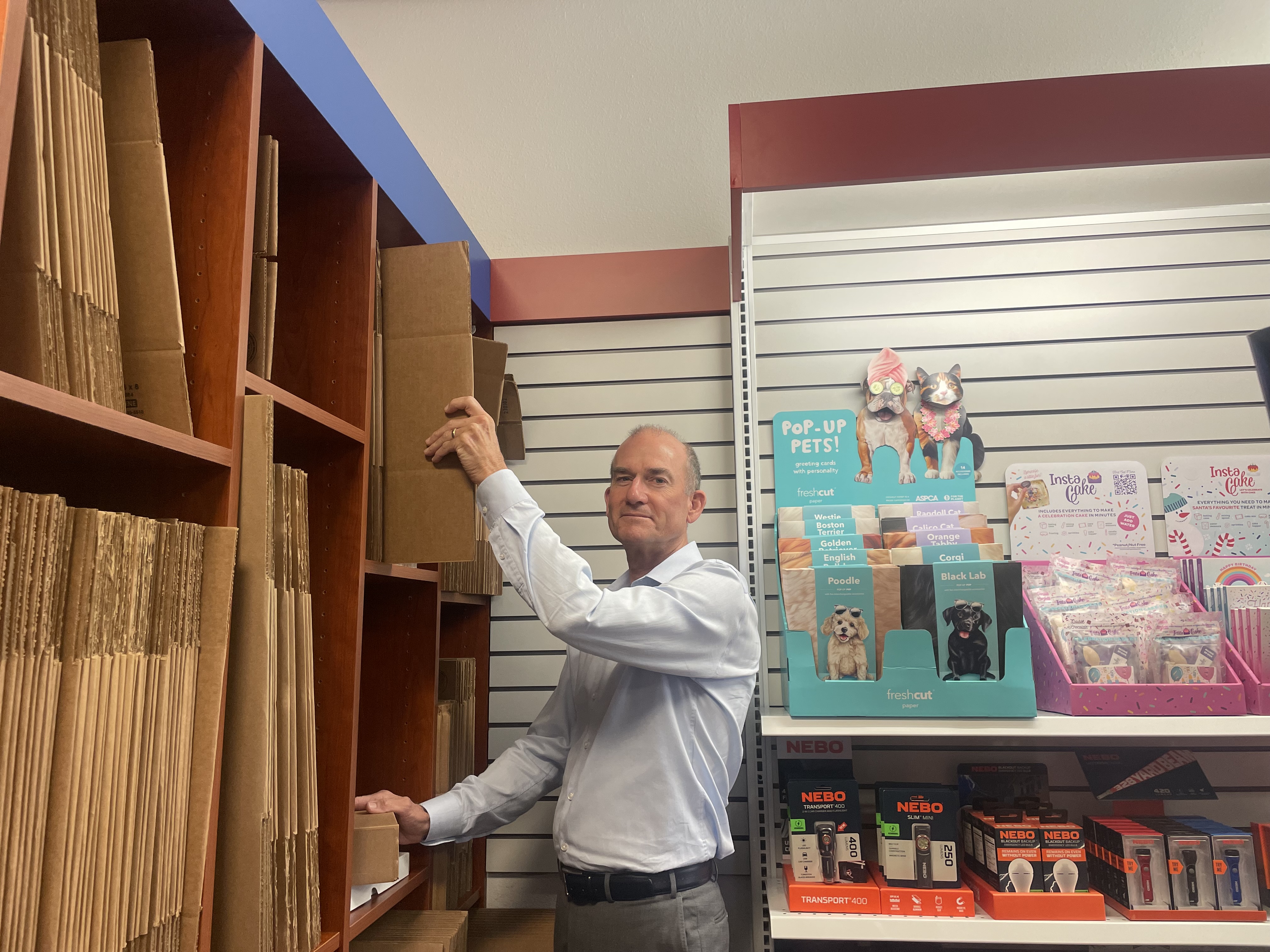 Patrick Edd in a model storefront at Annex Brands HQ. Photo by Madison Geering, San Diego Business Journal.